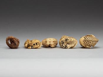 A set of eight Japanese ivory and bone Netsukes, Meiji period.