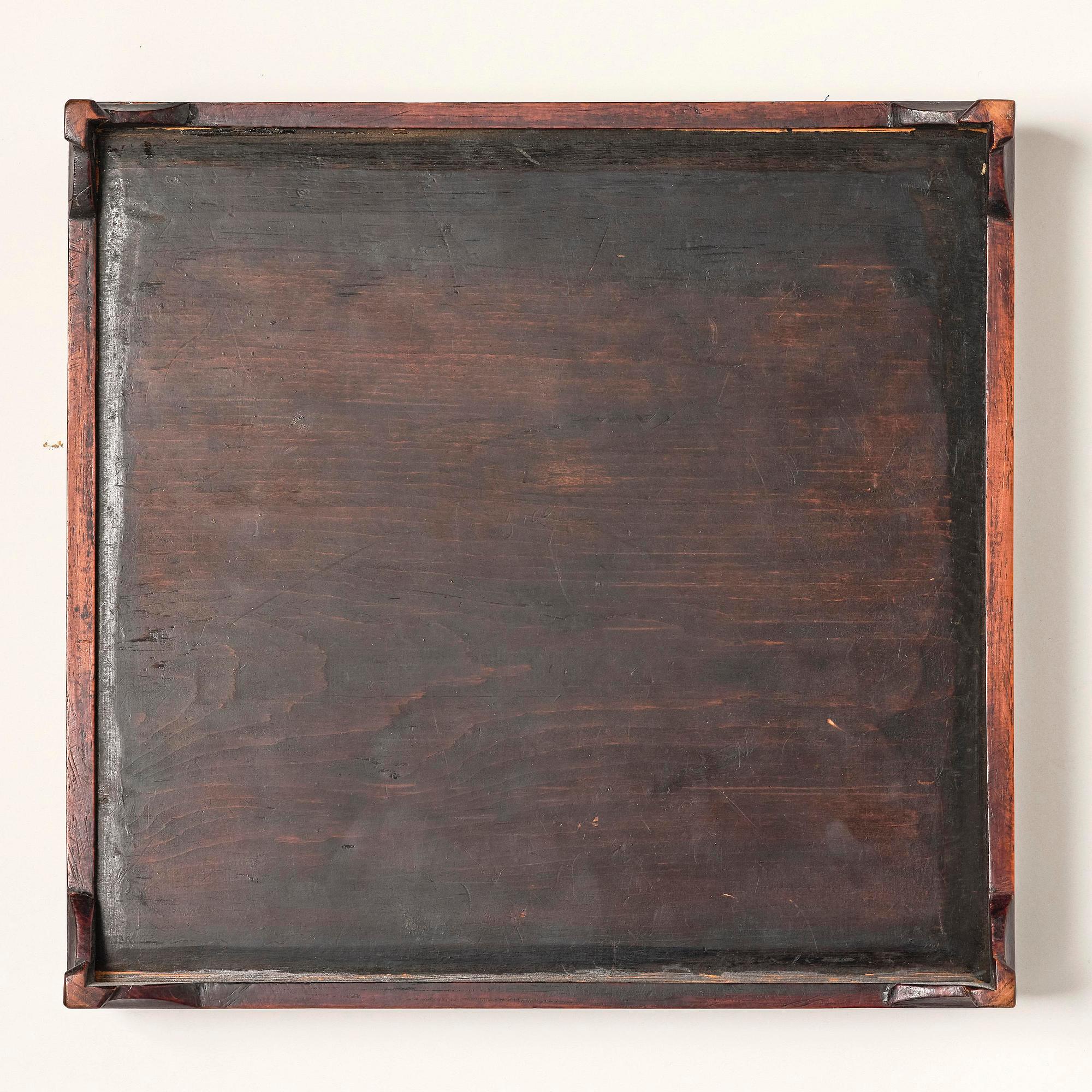 A Chinese kesi insignia/buzi mounted in a tray, late Qing dynasty.