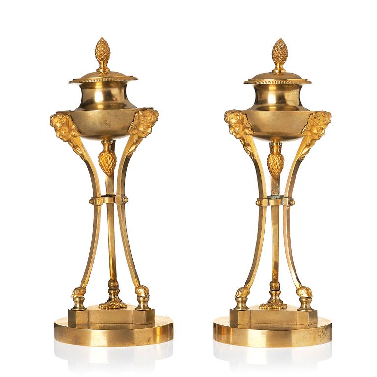 A pair of Empire tripod shaped casolettes.