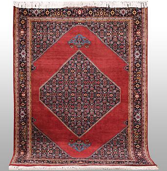 A rug, Tabriz, ca 241 x 167 cm.