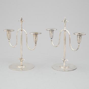 a pair of Elis Bergh silver plated candelabras, Swedish grace, CG Hallberg, Stockholm, 1920s.