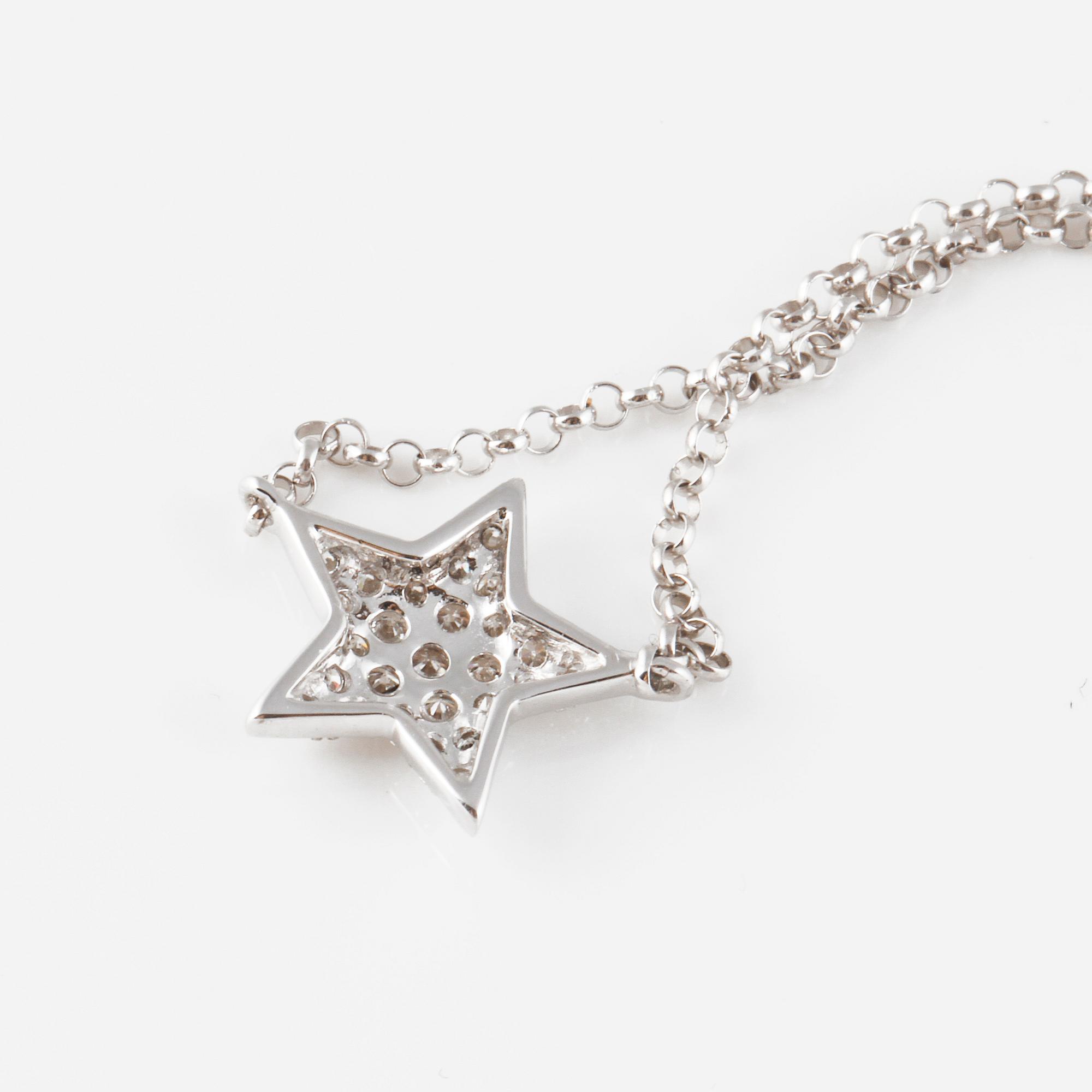 COLLIER, 18K vitguld med briljantslipade diamanter ca 0.15 ct. Vikt 1,8 gram.