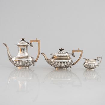 An English silver coffee pot, tea pot and cream jug, mark of Charles Boyton & Son Ltd, London 1917.