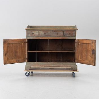 A 19th century sideboard.