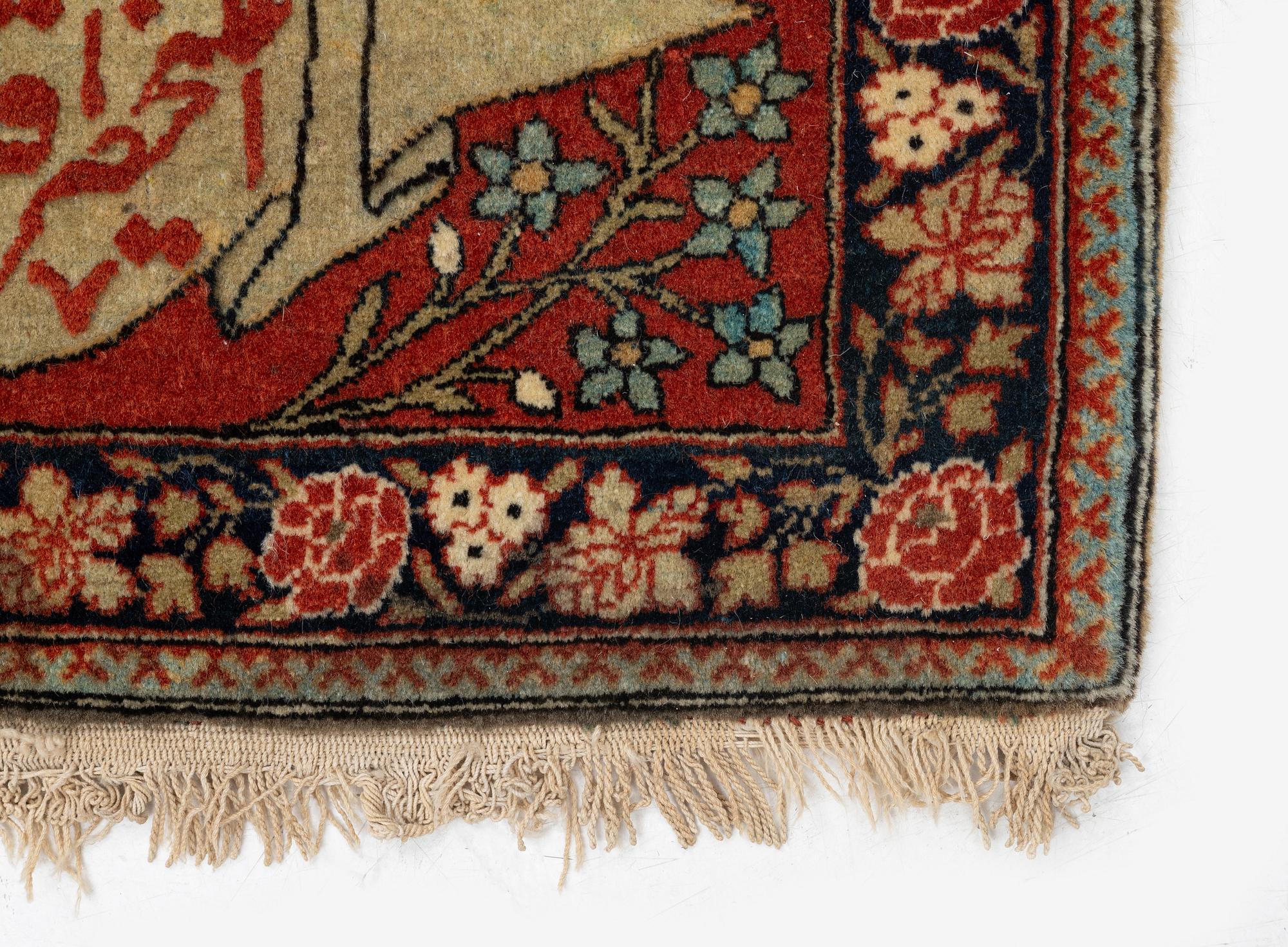 A pictoral Kashan 'Mohtasham' rug c. 80 x 58 cm.