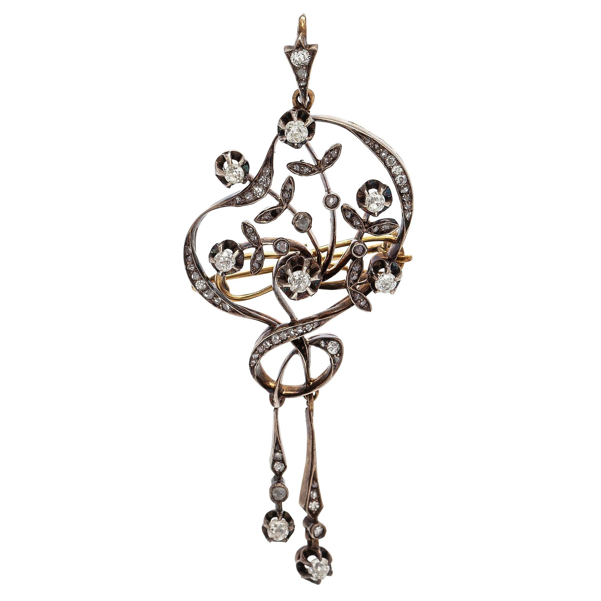Brosch/hänge, silver och guld med gammalslipade och rosenslipade diamanter.