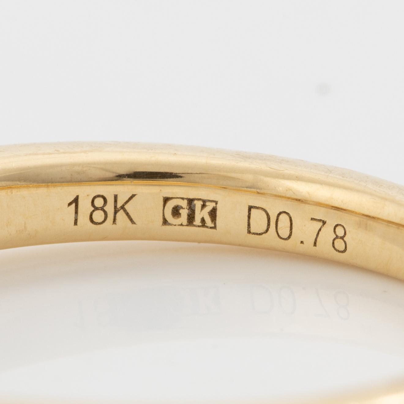 Ring in 18K gold set with five brilliant-cut diamonds, a total of 0.78 ct.