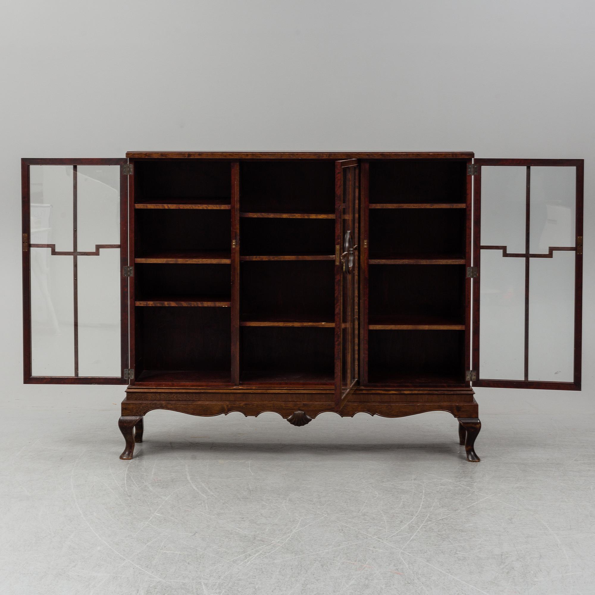 A 1920's/30's vitrine cabinet.