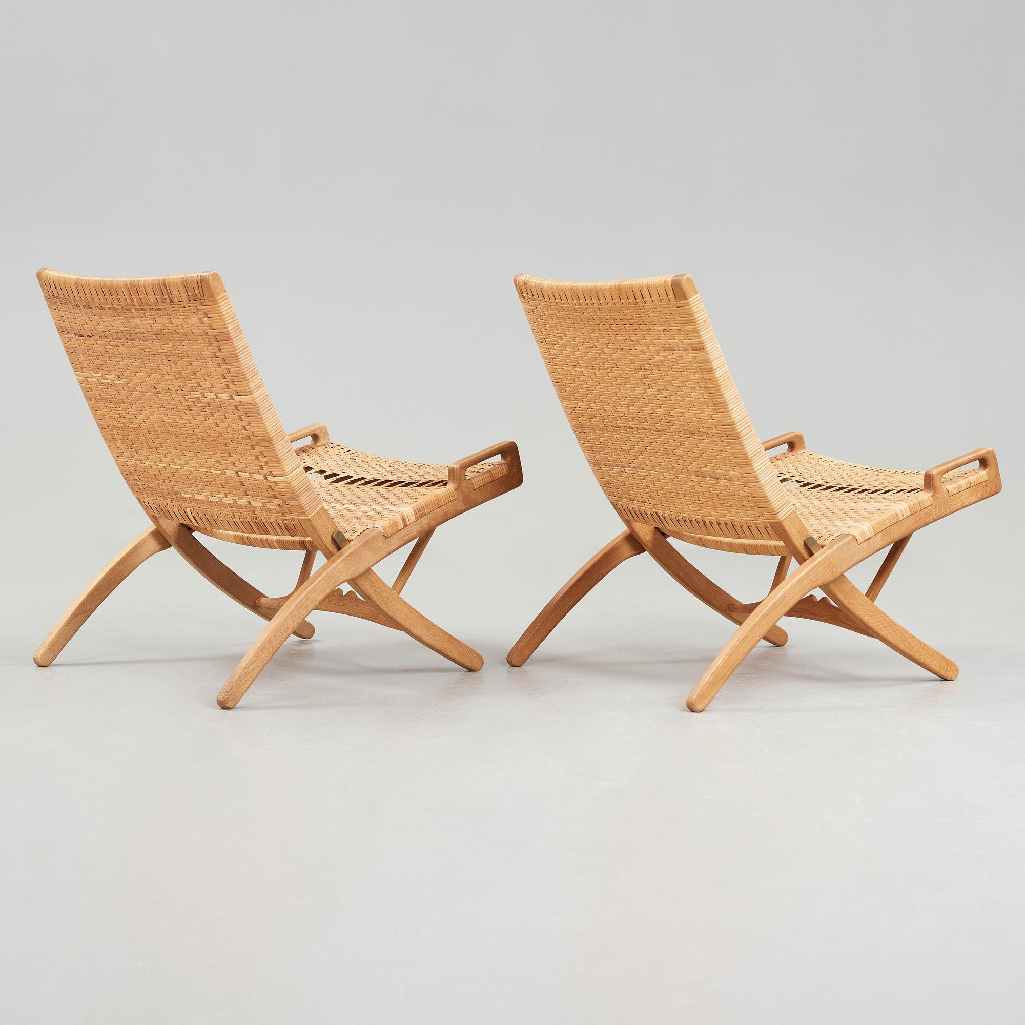 Hans J. Wegner, A pair of Hans J Wegner model 512 oak 'Folding Chairs' executed by Johannes Hansen, Denmark 1950's.