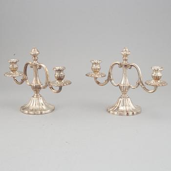 Kandelabrar, ett par, silver, svensk importstämpel.