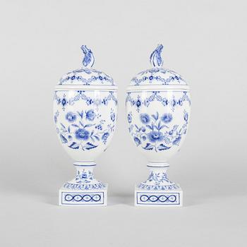 A pair of 'Blue Fluted Plain' porcelain urns with covers, Royal Copenhagen, model 286, 1898-1923.