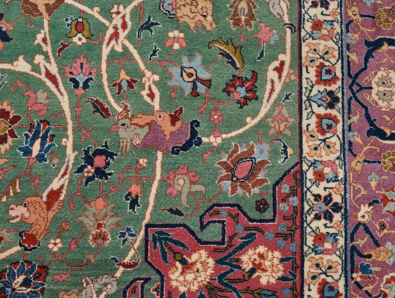 A carpet, a semi-antique Tabriz, ca 374-376,5 x 268-276 cm.