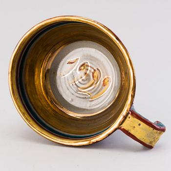Toini Muona, MALJA, punasavea, signeerattu TM ja päiviätty 1929.