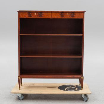 A bookcase, mid-20th Century.