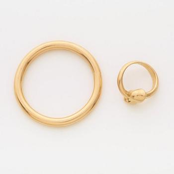 A set of two Kristian Nilsson 18k gold pieces of jewelry, Stockholm 1984 and 1982.