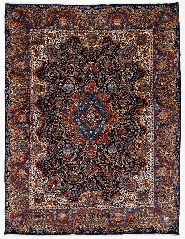 A Kashmar rug, c. 396 x 300 cm.