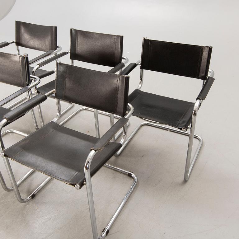 A set of five similar Italian 1970s chrome and leather armchairs.