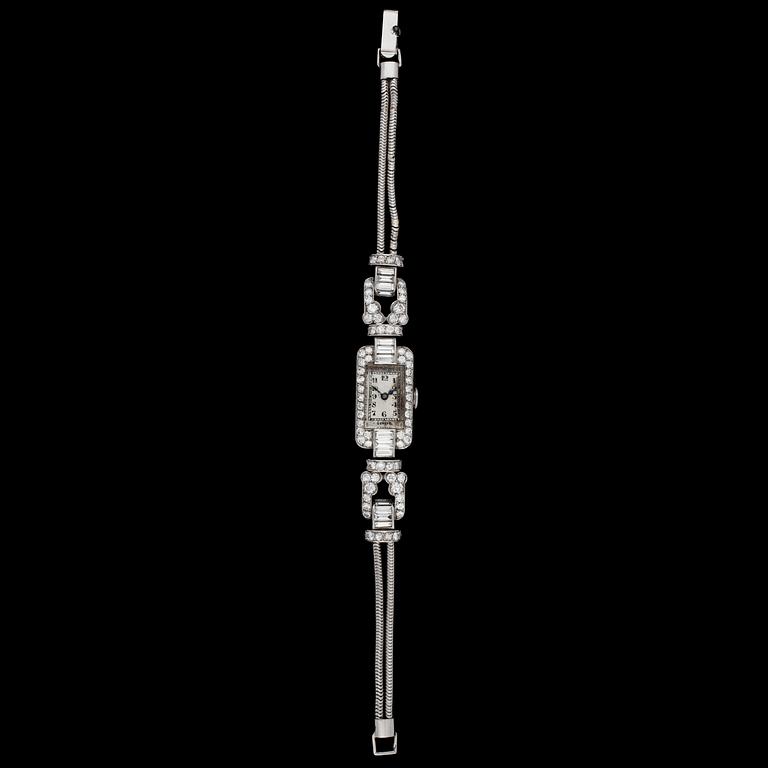 A diamond ladie's wrist watch, tot. app. 4 cts.