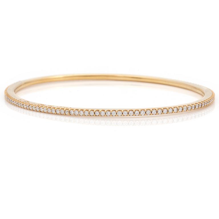 A brilliant cut diamond "Love bracelet" bangle by Ole Lynggard.