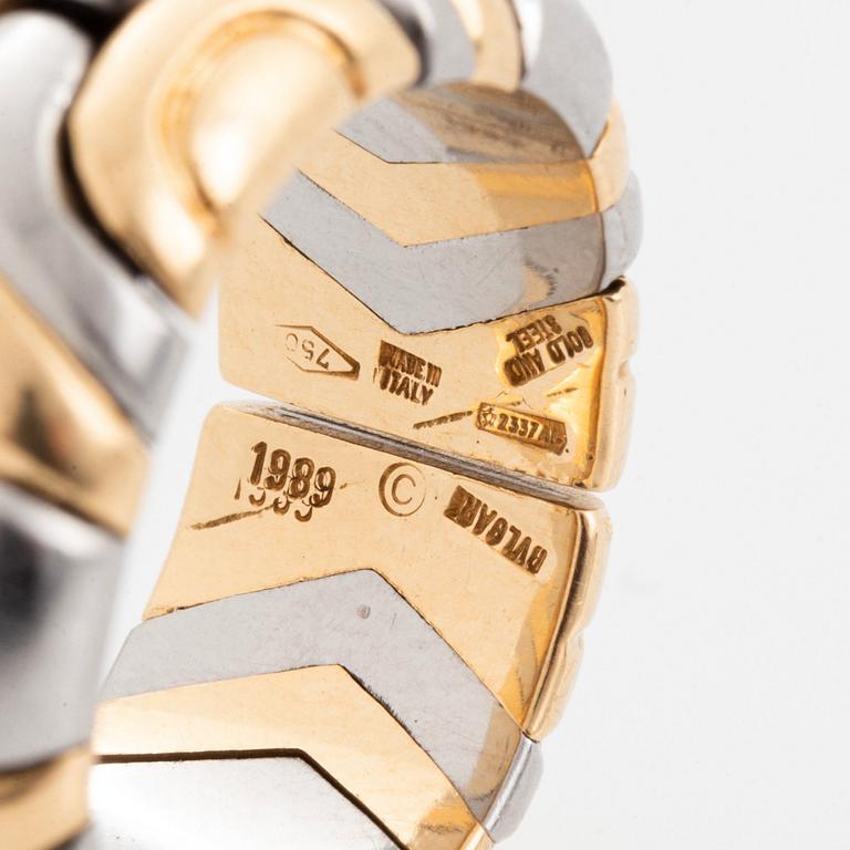 A Bulgari 18K gold and steel ring.