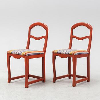 A pair of painted chairs by Carl Malmsten, second half of the 20th Century.