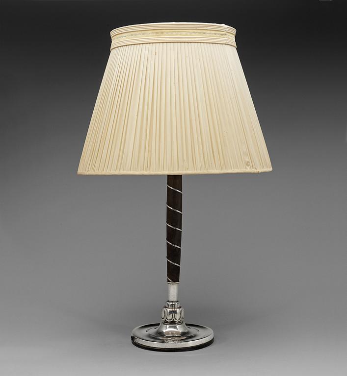 A C.G. Hallberg ebonized wood and silver table lamp, Stockholm 1928.