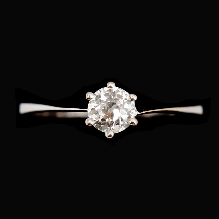 RING, 18 k, med solitär briljantslipad diamant ca 0.50 ct.