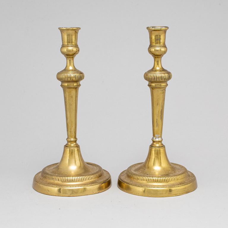 A pair of late 18th century candlesticks.