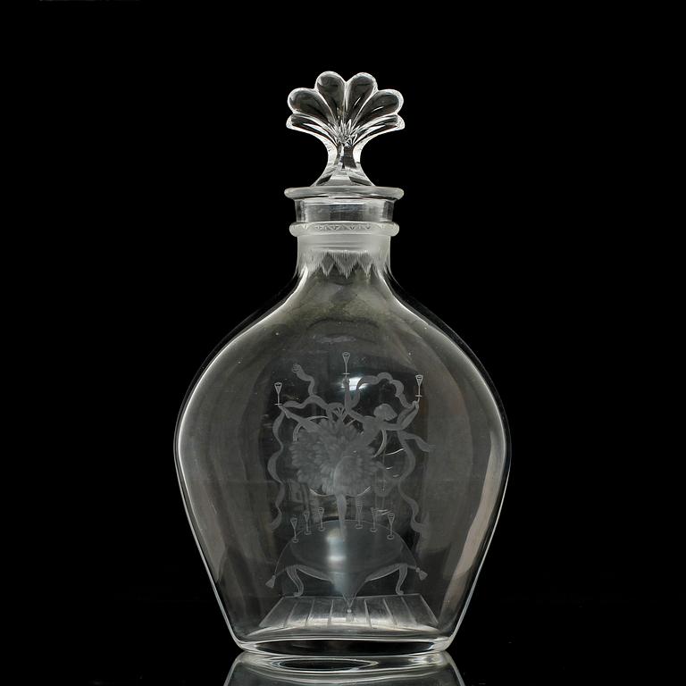 A Simon Gate engraved glass decanter with stopper, Orrefors, 1926.