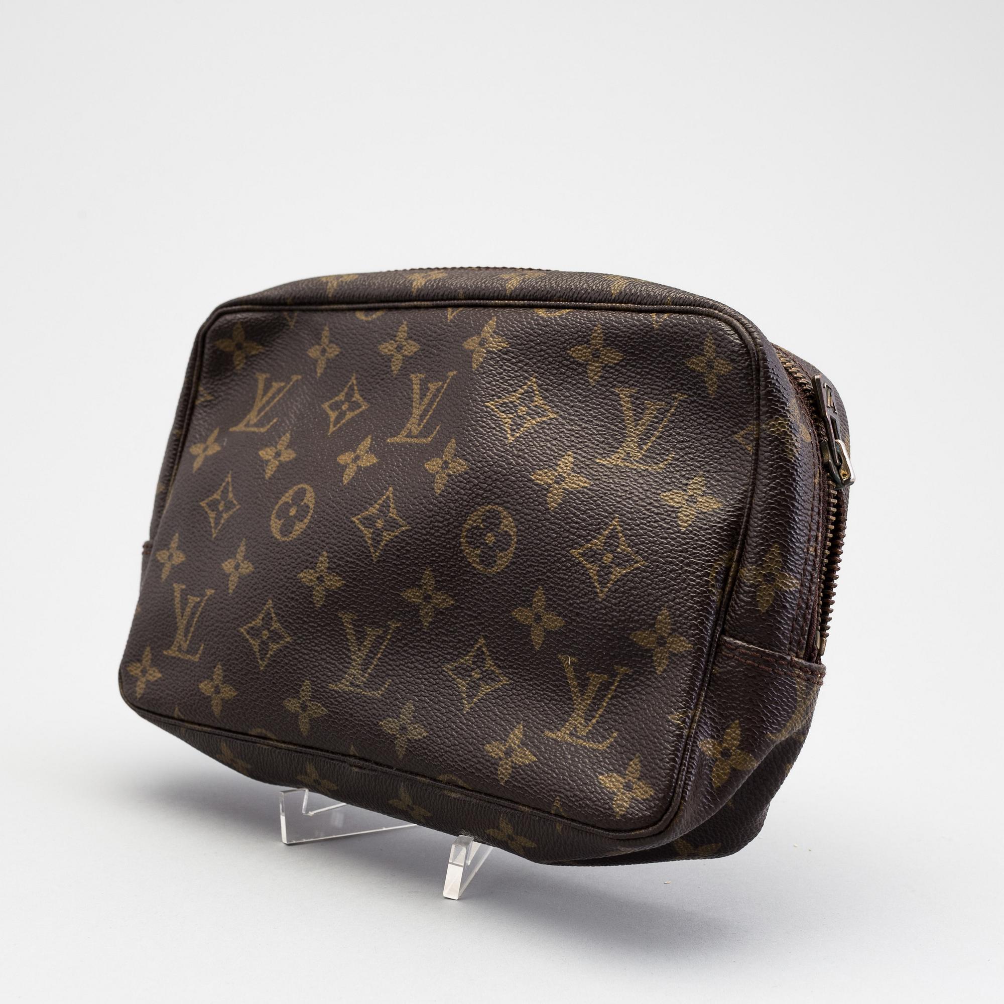 A Louis Vuitton toiletry bag.