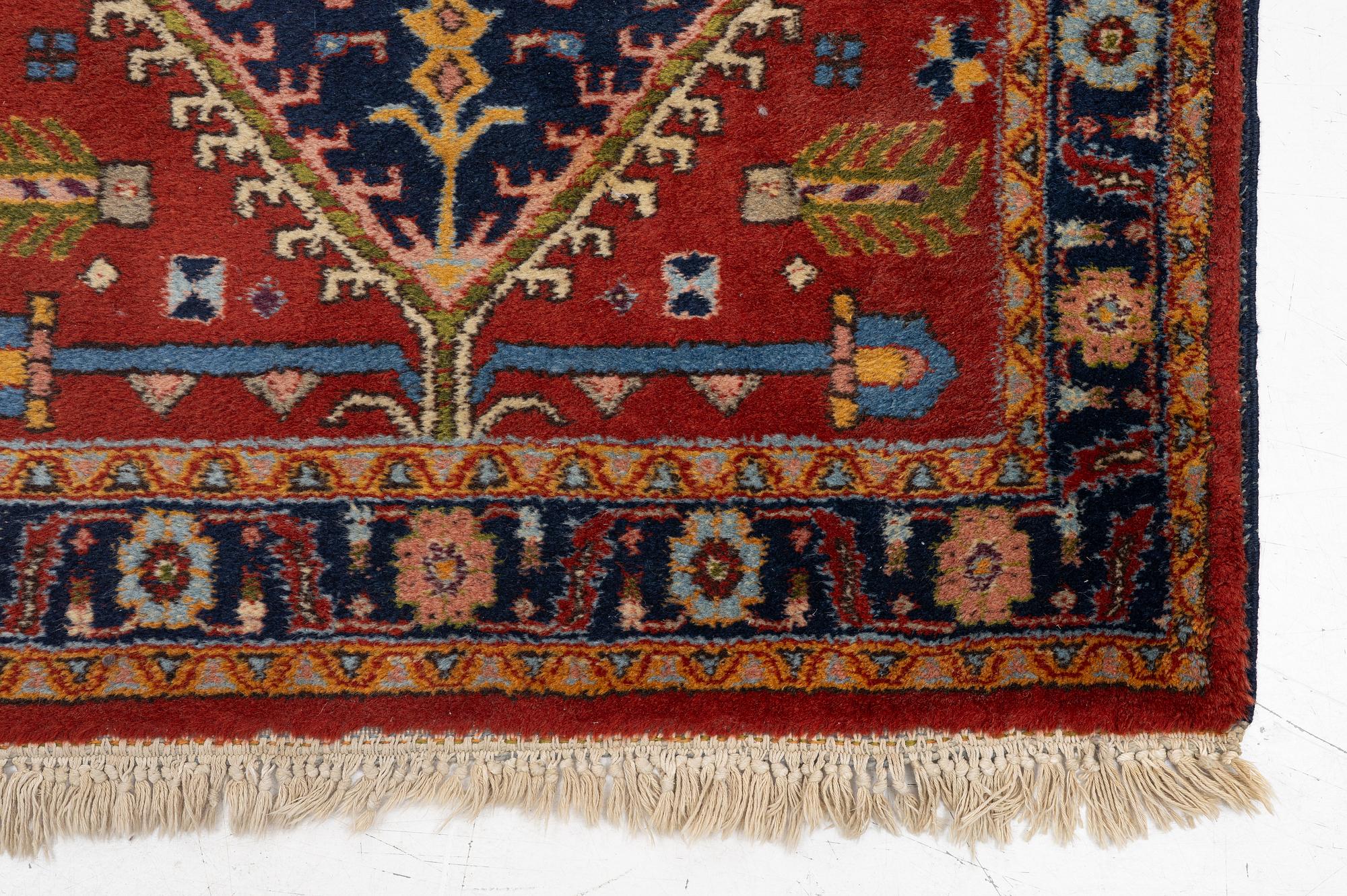 A semi-antique Kurdish runner, 350 x 140 cm.