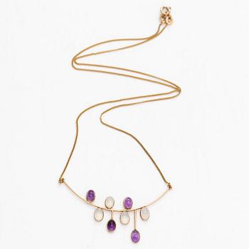 Kaulakoru, 14K kultaa, cabochonhiottu kuukvartsi ja ametisti. Suomalaiset leimat.