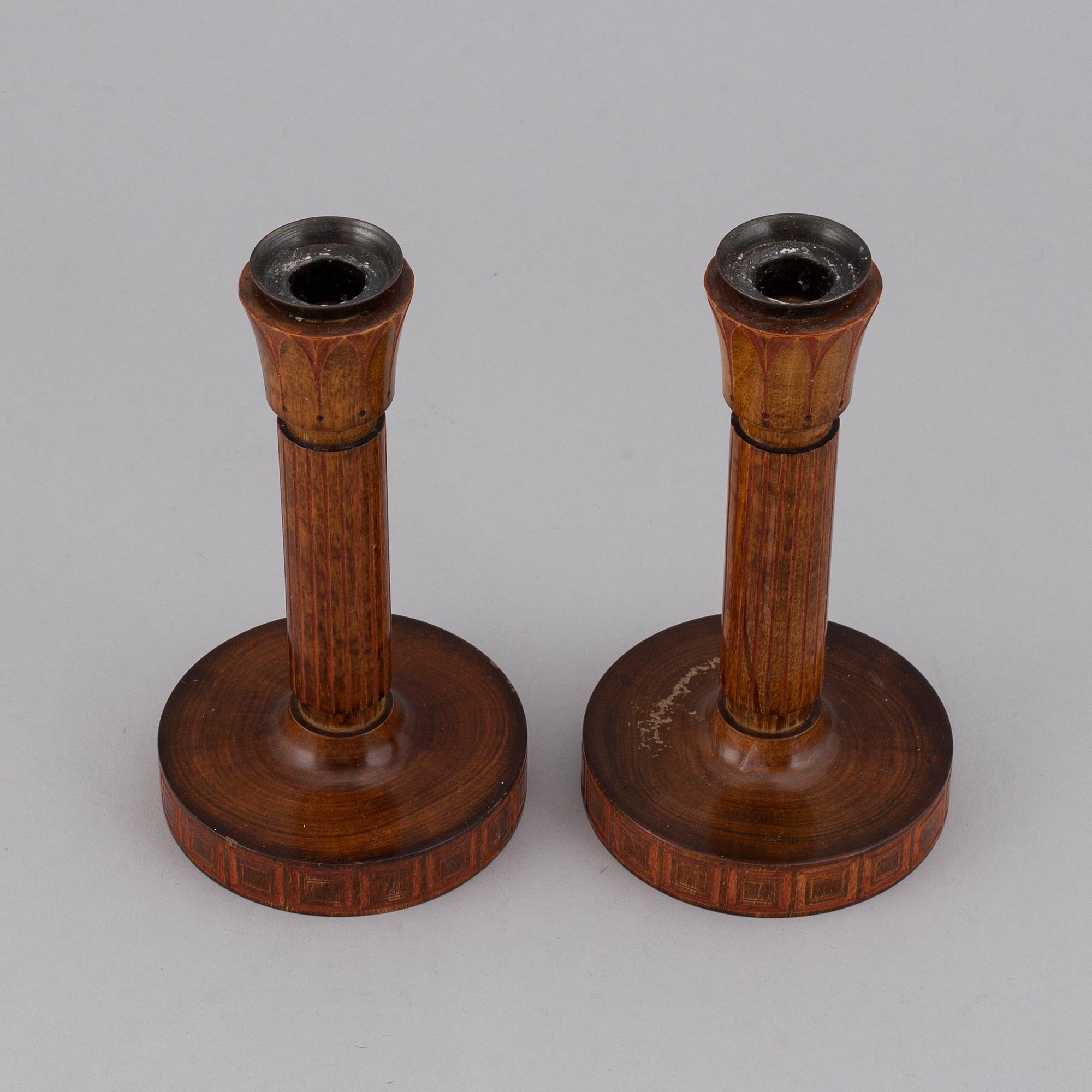 A pair of 1920s art déco wood candlesticks design Olof Ahlberg.