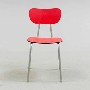 A mid 20th century table and chair.
