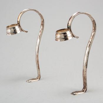 A pair of 20th century silver plated bottle holders.