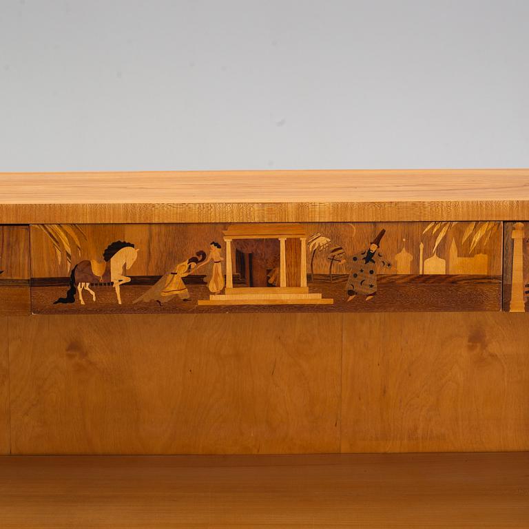 An inlaid bookcase from Mjölby Intarsia, 1930's.