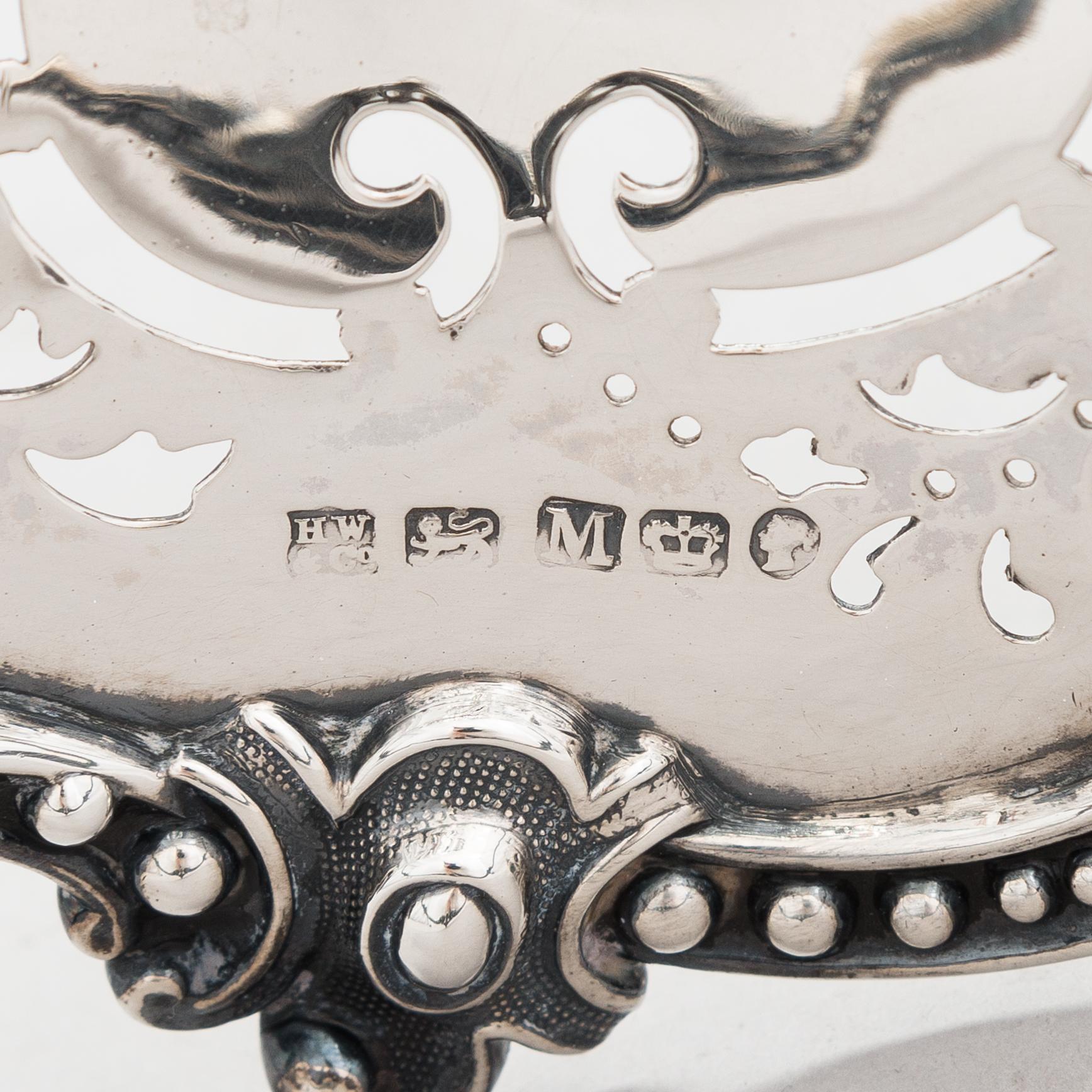 A Victorian sterling silver sweetmeat basket, maker's mark of Henry Wilkinson & Co, Sheffield 1855.
