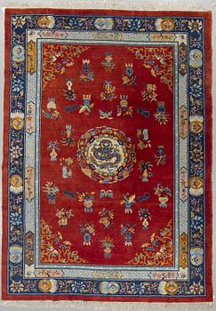 A carpet, semi-antique/old Kina, ca 295,5 x 212 cm.