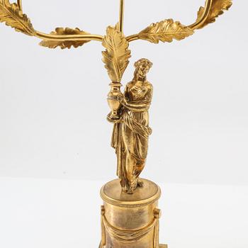 A pair of Empire candelabras from the first half of the 19th century.