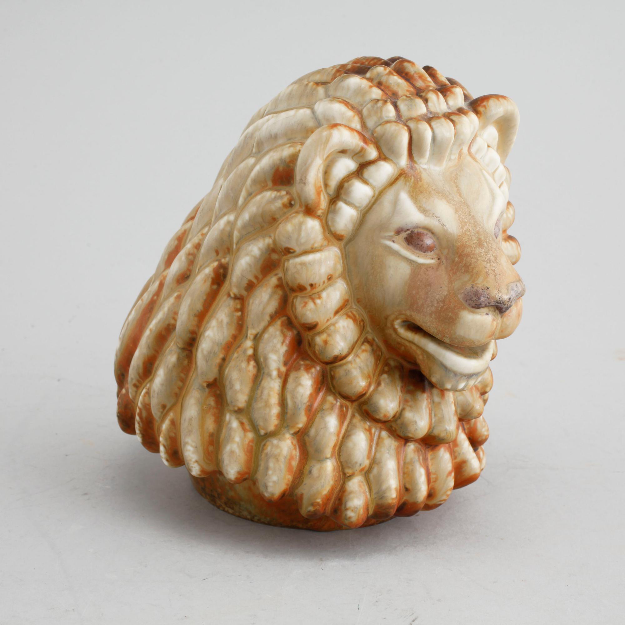 A stoneware figurine, designed by Gunnar Nylund for Rörstrand in the mid 20th century.