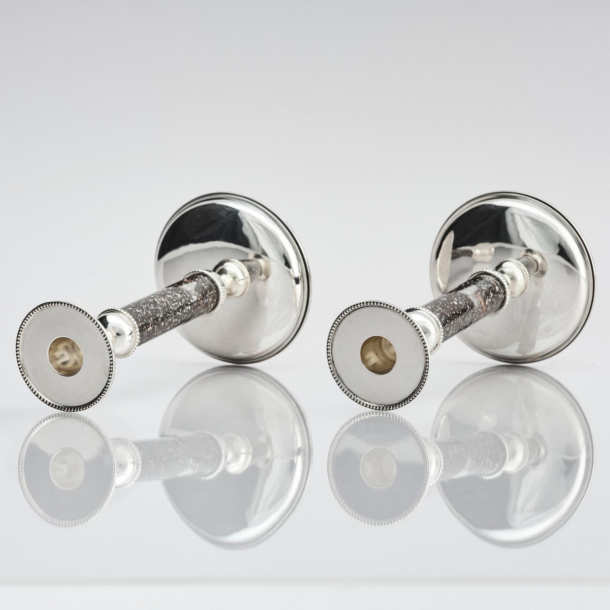 Henrik Ingemansson, a pair of sterling silver and Älvdal porphyry candelsticks, Ingemansson's Smithy, Stockholm, 2002.