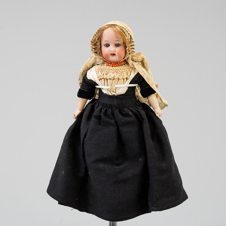 a HEUBACH KÖPPELSDORF porcelain doll, Germany in the first half of the 20th century.