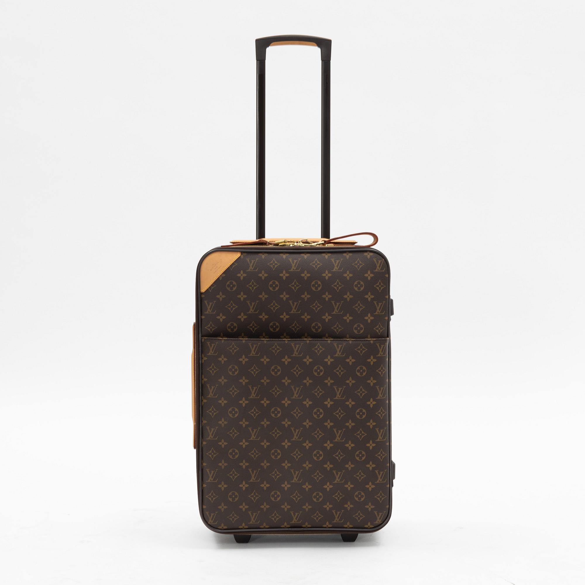 Louis Vuitton, a monogram canvas 'Pégase 60' suitcase, 2004.