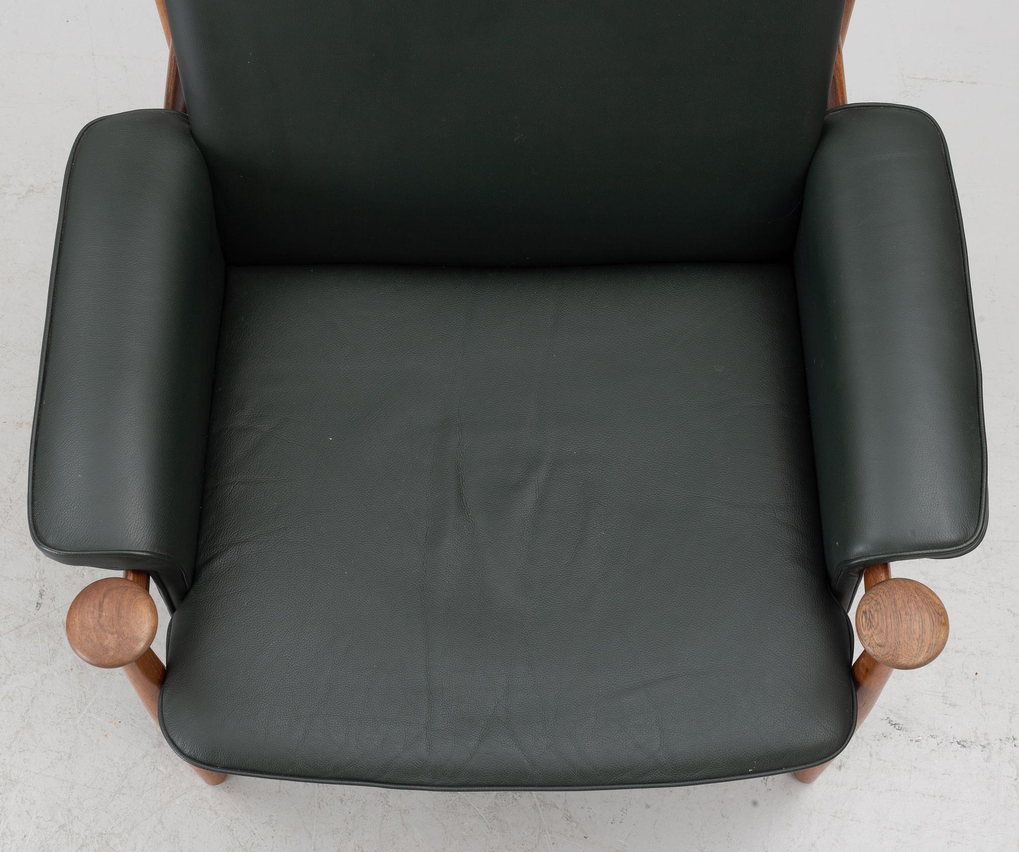 Finn Juhl, a 'Bwana' armchair and ottoman, France & Son, Denmark, 1960's.