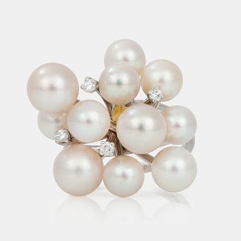 514. A cultured pearl and diamond ring.