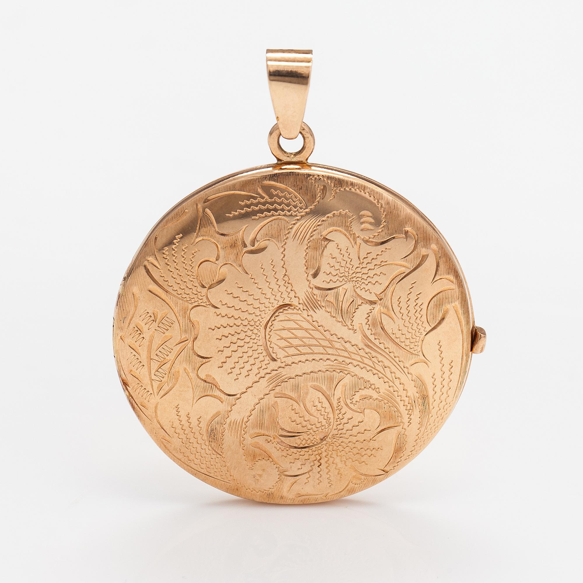 A 14K gold locket. Finnish import marks.