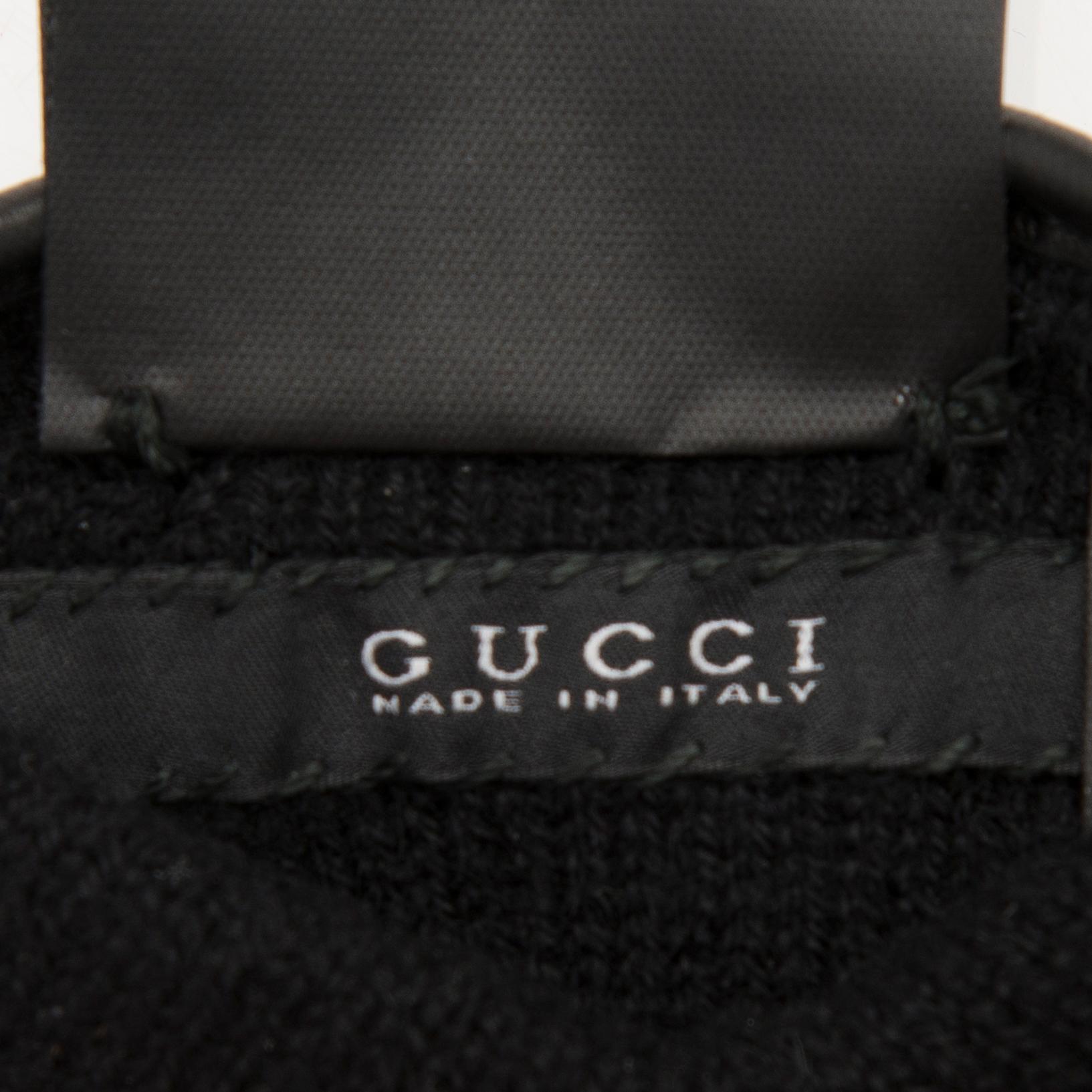 A pair of Gucci ladies' leather gloves.