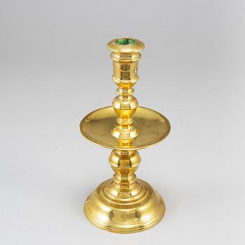 A bronze candlestick, 16th/17th century.
