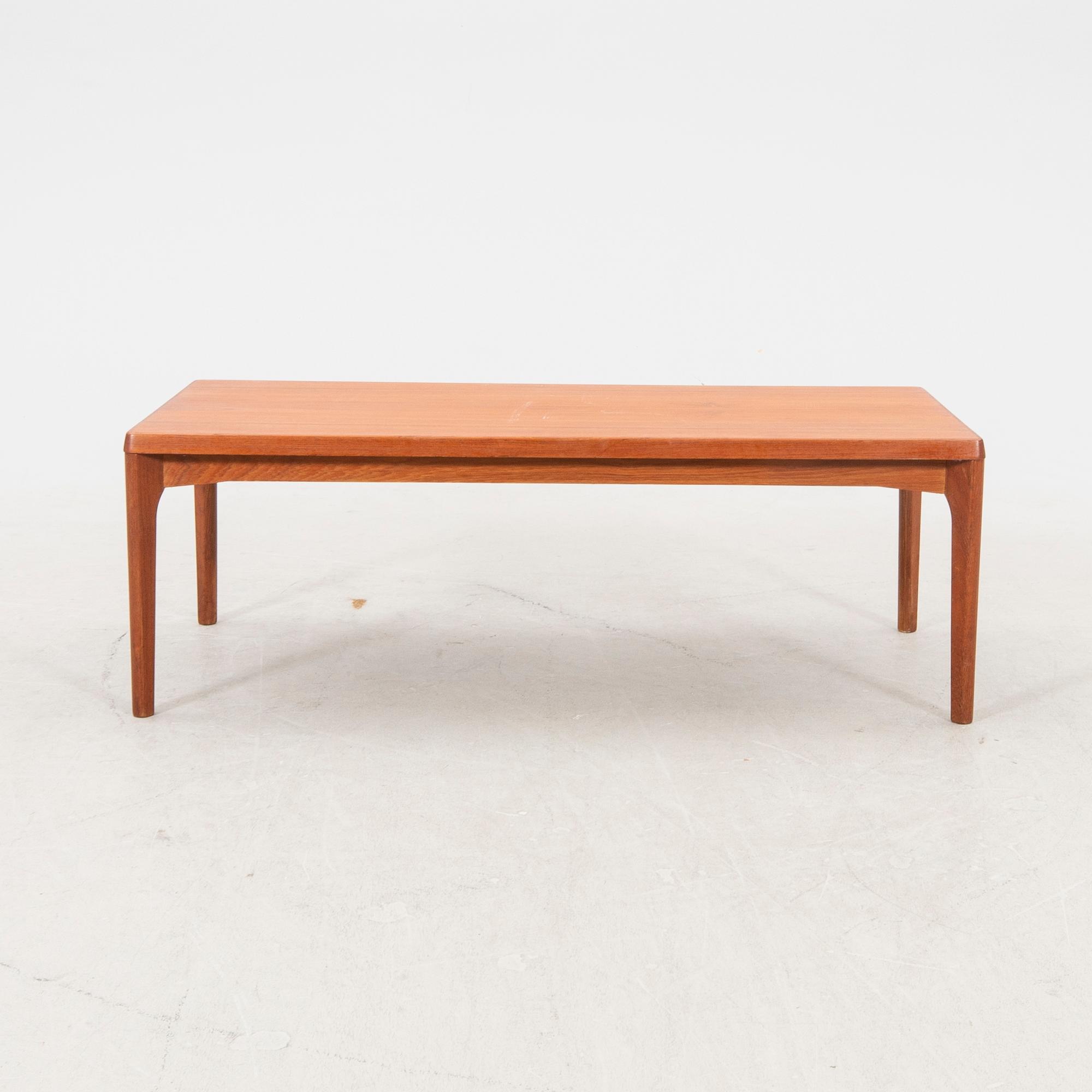 A teak coffee table second part of the 20th century.