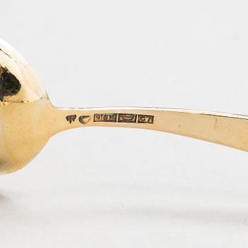 A set of six enamelled, gilt silver espresso spoons, Tillander, Helsinki 1955-56.